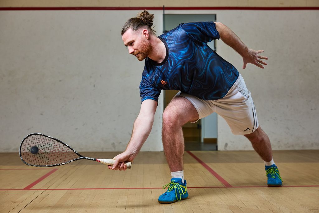 man playing squash at bluecoat sports