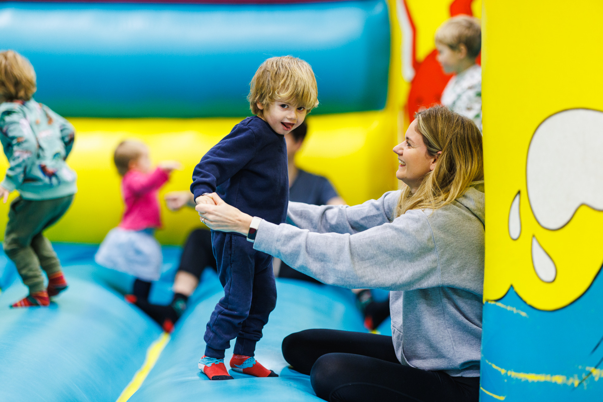 Child stood on a bouncy castle