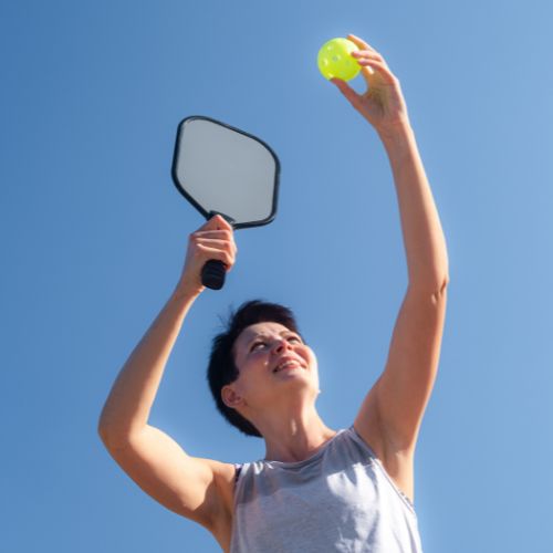 woman playing pickleball