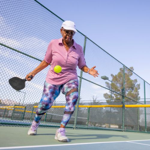 woman playing pickleball