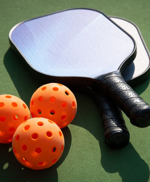 pickleball racket and balls